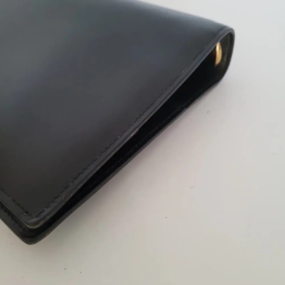 Cartier Black Leather Planner with Gold Panther Accent
